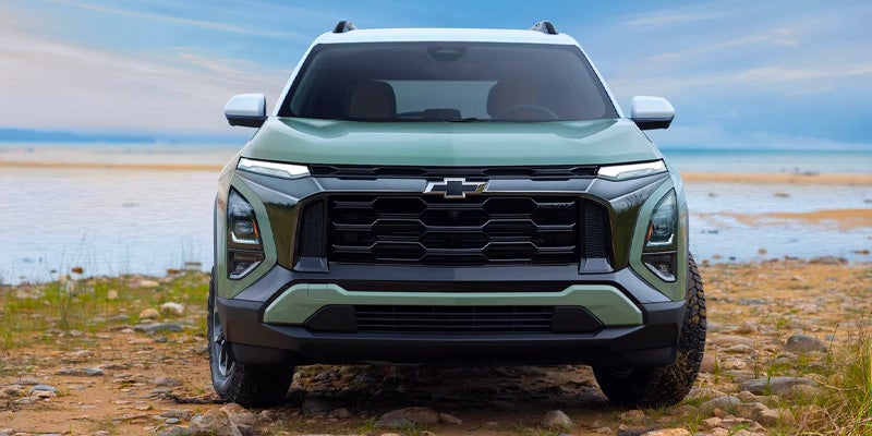 Vehicle infotainment system displaying apps like PlayStore, Google Assistant, Climate, and Google Maps.